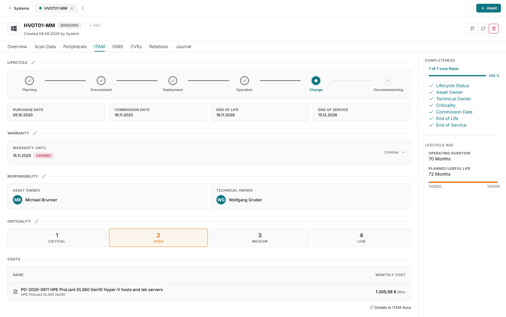Docusnap365 ITAM tab of a Windows system detail view with lifecycle stepper, key dates, warranty, responsibility, criticality, a monthly costs table and a completeness panel